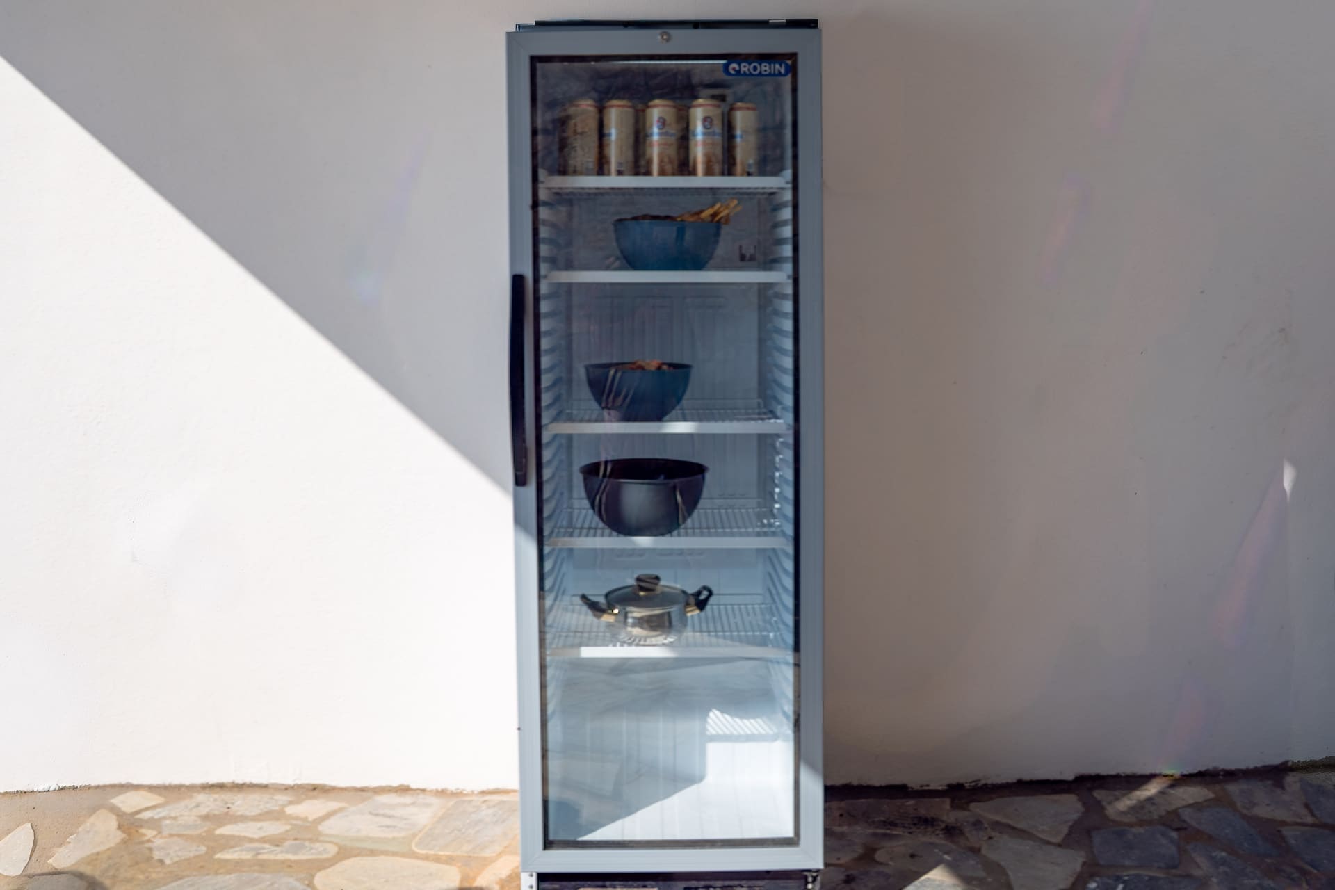 Outdoor bar with drinks refrigerator at the shared BBQ area, Plakias Crete