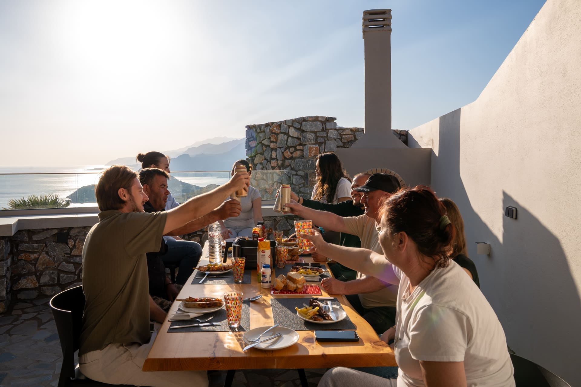 BBQ Endless View at Secret Oasis hill villas, Plakias South Crete — group sunset toast with sea view